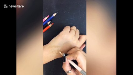 Chinese art teacher draws incredibly realistic facial features ON HER ARM