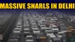 Poor visibility, police barricades cause massive traffic snarls in Delhi | OneIndia News