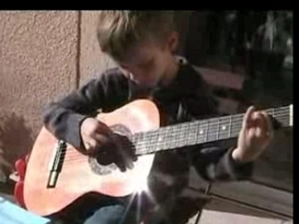 Tom guitare