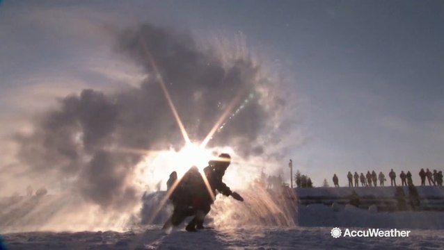 Water freezes in mid-air as temperatures plummet