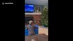 Magical! Toddler amazed when Xmas tree lights up with a wave in Colorado