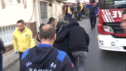 Yangında mahsur kalan hamile kadın, ip yardımıyla kurtarıldı