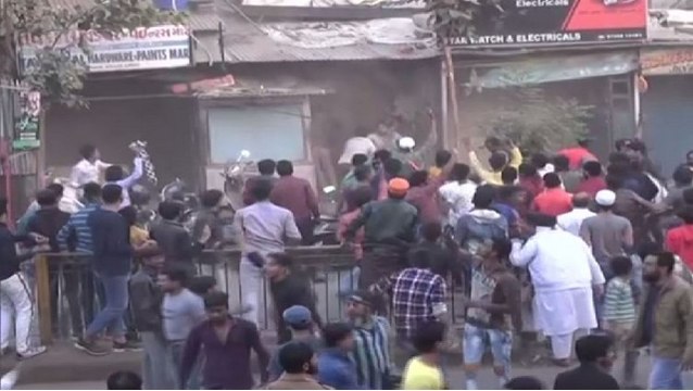 CAA stir in Ahmedabad: Cops brutally attacked by stone pelting