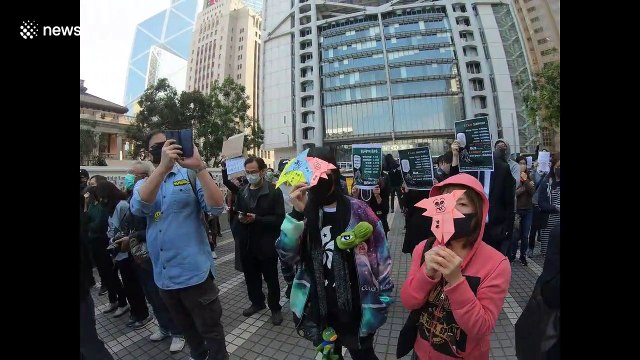 Demonstrators sing 'Glory to Hong Kong' during peaceful protest