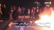 متظارهون لبنانيون يقطعون الطرقات احتجاجاً على تكليف دياب تشكيل الحكومة