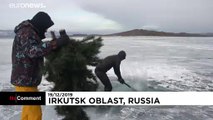 Russian ice divers put up New Year's tree in Lake Baikal