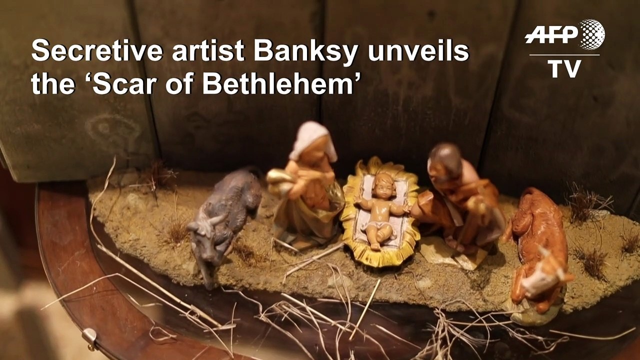 Mysterious artist Banksy unveils dark nativity in Bethlehem