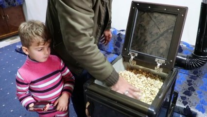 Winter-hit Syrians turn to pistachio shells for heat