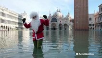Santa spotted wading through floodwaters in Venice