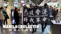 Hong Kong protesters march, scuffle with police in shopping mall