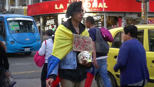 Protesters in Bogota hold tribute for teenager who was killed by police in recent protests