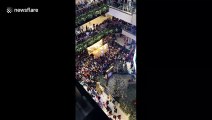 Balloon-drop triggers stampede in Sydney mall, injuring Christmas shoppers