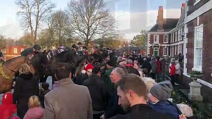 Christmas spirit! Even the King's Troop wear festive jumpers for their traditional ride through London