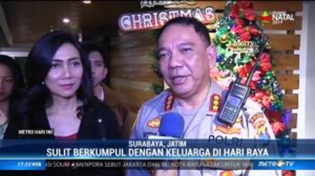 Suka Duka Polisi dalam Perayaan Natal