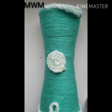 Flower vase using Disposable glass and yarn