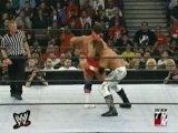 WWE - Edge sloppily german suplexes Angle on his shoulder