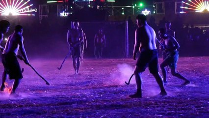 Locals play 'fire hockey' with ball of burning embers in northern Thailand