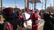 Santa Claus alivia la dura espera de niños migrantes en mexicana Ciudad Juárez