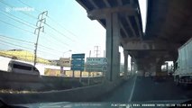 Strange moment Thai motorcyclists fails to navigate pebbles on highway and nearly gets hit