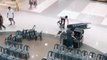 Super Fast Worker Arranges Chairs at Fast Pace in Mall