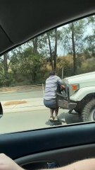 Man Hangs By Truck's Bull Bar for Kilometers
