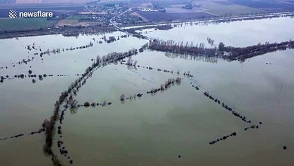 Drone footage reveals scale of flooding in English county