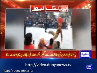 Indian soldier falls down in front of charged crowd at Ganda Singh Border