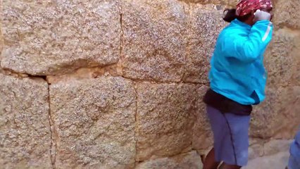 Man Climbs Stone Wall with Extreme Speed