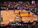 Dwyane Wade as he drives to the hoop and puts up a no-look p