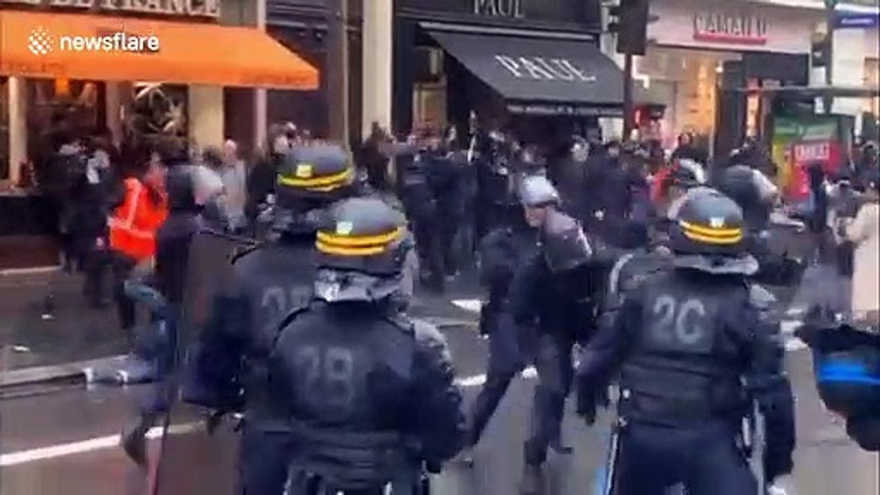 French police violently detain protester on streets of Paris during extended strike