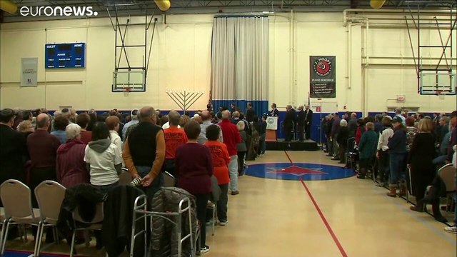 New York Hannukah stabbing suspect appears in court as vigil held for victims