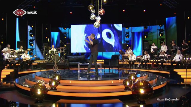 Sümer Ezgü: Sümer Ezgü | Dam Başında Sarı Çiçek