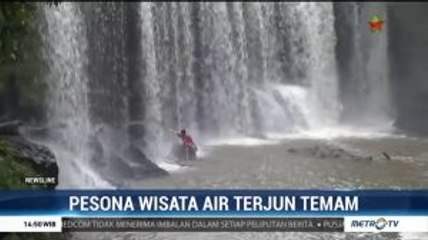 Cantiknya Air Terjun Temam yang Memanjang Bak Tirai