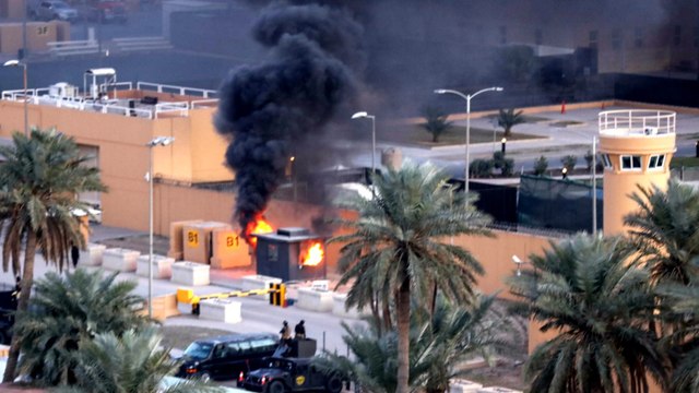 Iraq protests: Popular Mobilisation Forces supporters surround US embassy