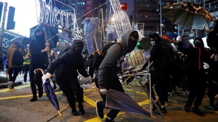 Police fire tear gas as Hong Kong rings in New Year