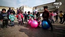 Syria displaced start new year in abandoned prison