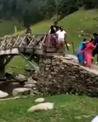 Womens fighting with each other on bridge in Murree