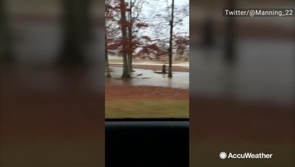 Download Video: Floodwaters rising off the road