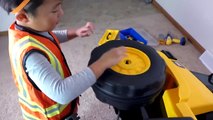 Ivan Unboxing and Assembling Dump Truck Tractor Ride