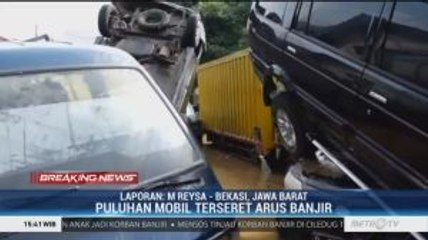 Banjir di Pondok Gede Permai Menyisakan Tumpukan Mobil