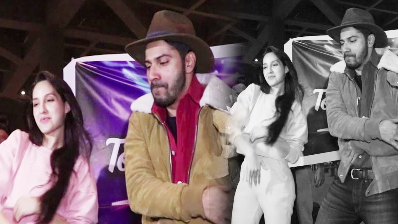 Nora Fatehi & Varun Dhawan dance at Mumbai airp...