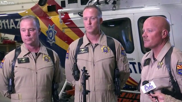 Sauvetage d'un BASE Jumper dont le parachute est accroché à la falaise !