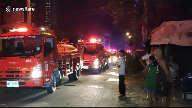 Hundreds of tourists evacuated after fire rips through apartment block in Thailand