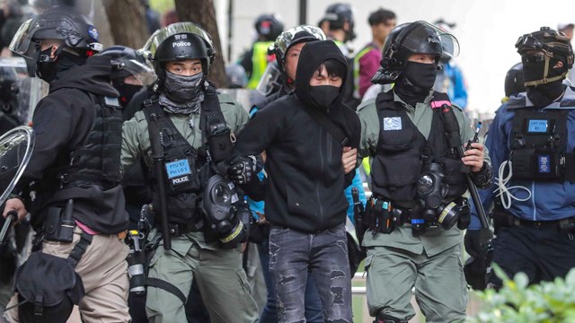 Dozens detained by police after march against parallel traders in Hong Kong’s Sheung Shui