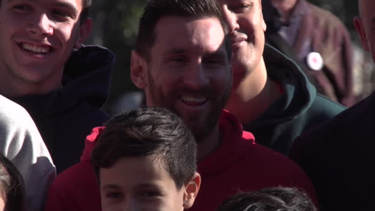 Messi and Suarez spread cheer at children's hos...