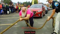 Powerful priest can pull a fire truck with his heavenly muscles(Video) World News