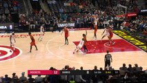 Kevin Huerter craftily feeds the John Collins slam