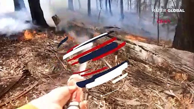 Alevlerin arasından yavru kanguruyu böyle kurtardı