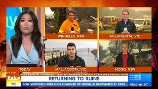 Australian bushfire towns wake to rain, threat of mega-fire looms _ Nine News Au