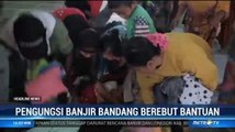 Korban Banjir Lebak Berebut Pakaian Bekas